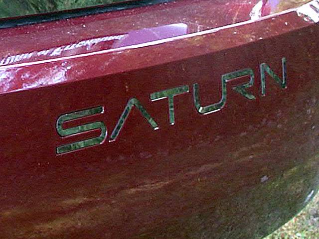 QAA - SATURN ION 4dr QAA Stainless 5pcs Graphic/Logo/emblem SGR45410